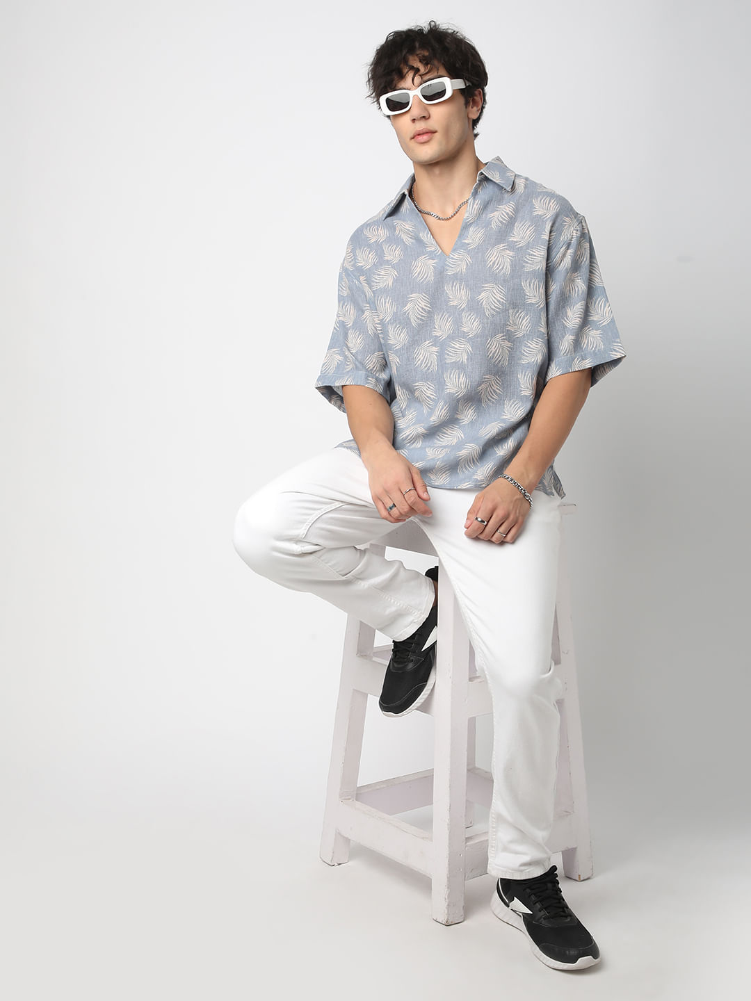 Powder Blue Coco Leaf Printed Burlap Oversized Polo Shirt Powder Blue Coco Leaf Printed Burlap Oversized Polo Shirt